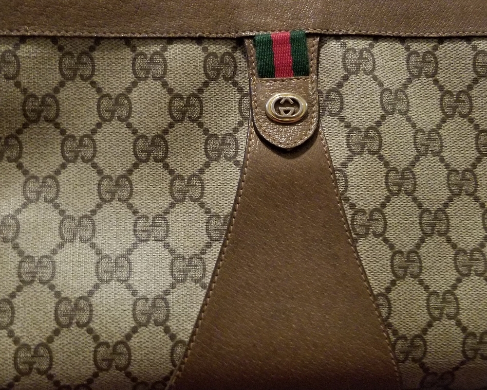 Vintage GG monogram brown leather coated clutch